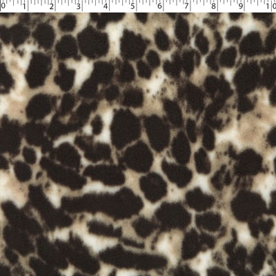 white, sand, and brown animal skin fleece